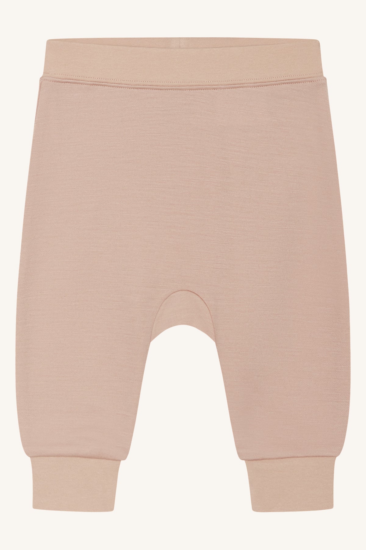 Schlichte Jogginghose aus weicher, dehnbarer Merinowolle mit Gummizug in der Taille und an den Beinen.
