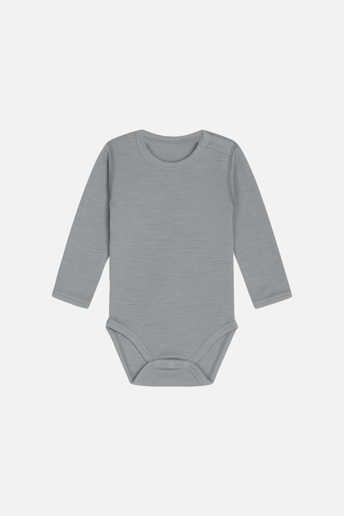 Einfarbiger Body aus weicher Stretch-Merinowolle von Hust & Claire. Popper-Verschlüsse an der linken Schulter und zwischen den Beinen.