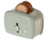 Dieser Metalltoaster wird mit 2 Brotscheiben geliefert