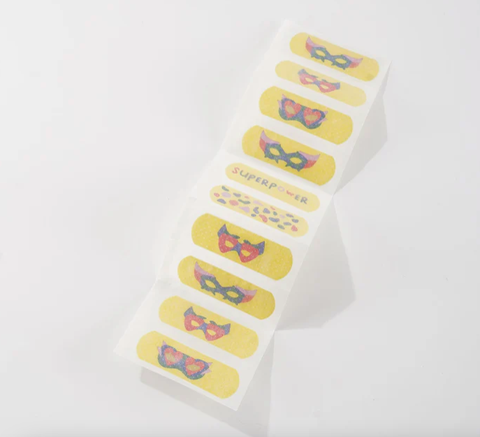 Wer wir wurden - Kinderpflaster "Superheld*in"