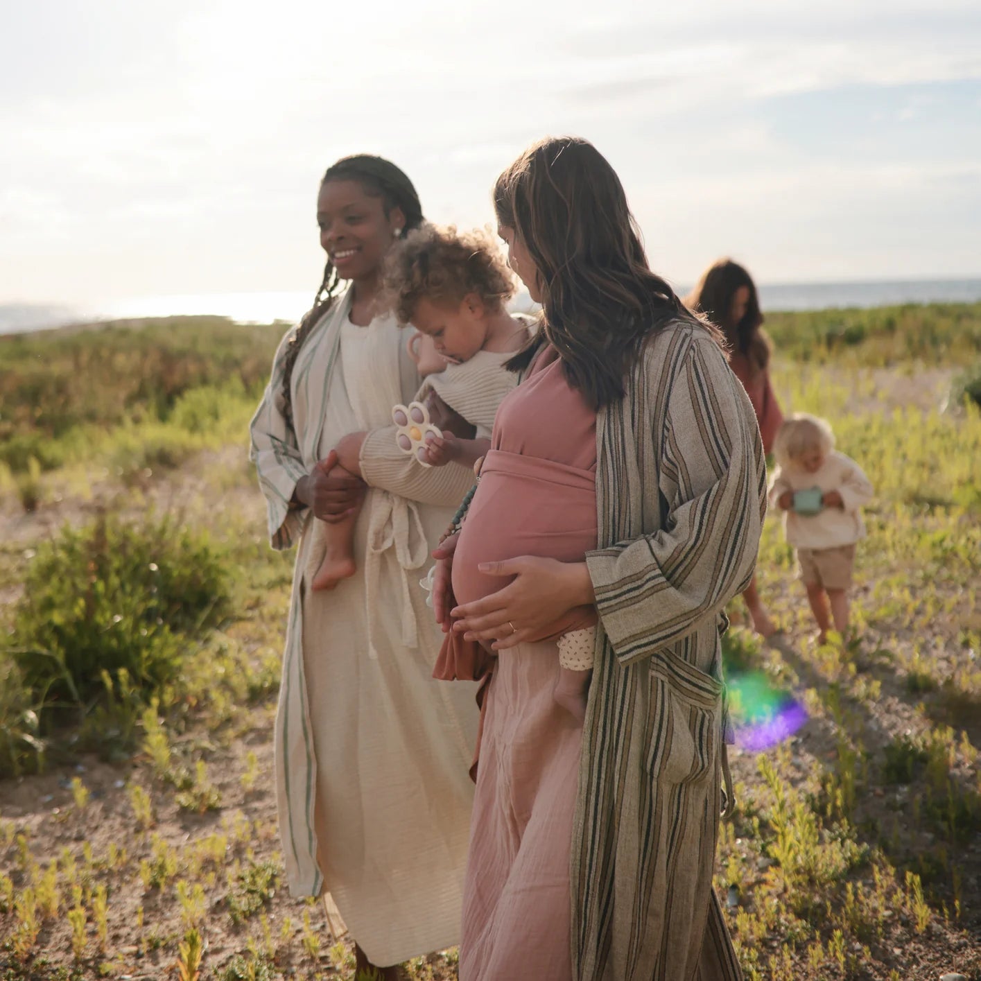 Mushie - Baby Drückspielzeug Blume flieder