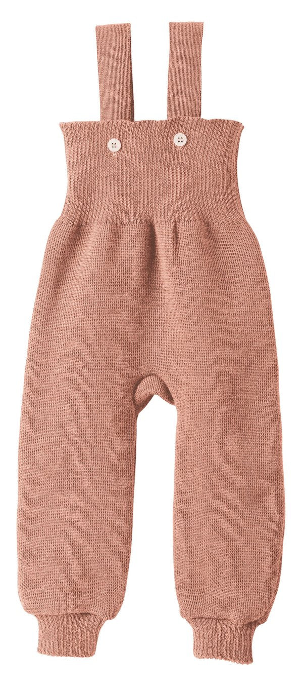 Rundum wohlfühlen mit der bewährten disana Strick-Trägerhose aus feiner Bio-Merinowolle. Egal ob beim Liegen, Krabbeln oder für die ersten Schritte. Unsere disana Strick-Trägerhose sorgt für angenehme Wärme und Wohlbefinden. Der besonders hoch geschnittene Bund umhüllt Bauch und Rücken, zwei abnehmbare Träger sorgen dafür, dass nichts verrutscht. Die Trägerhose ist am Po extra weit geschnitten - viel Platz fürs komplette Windelpaket!