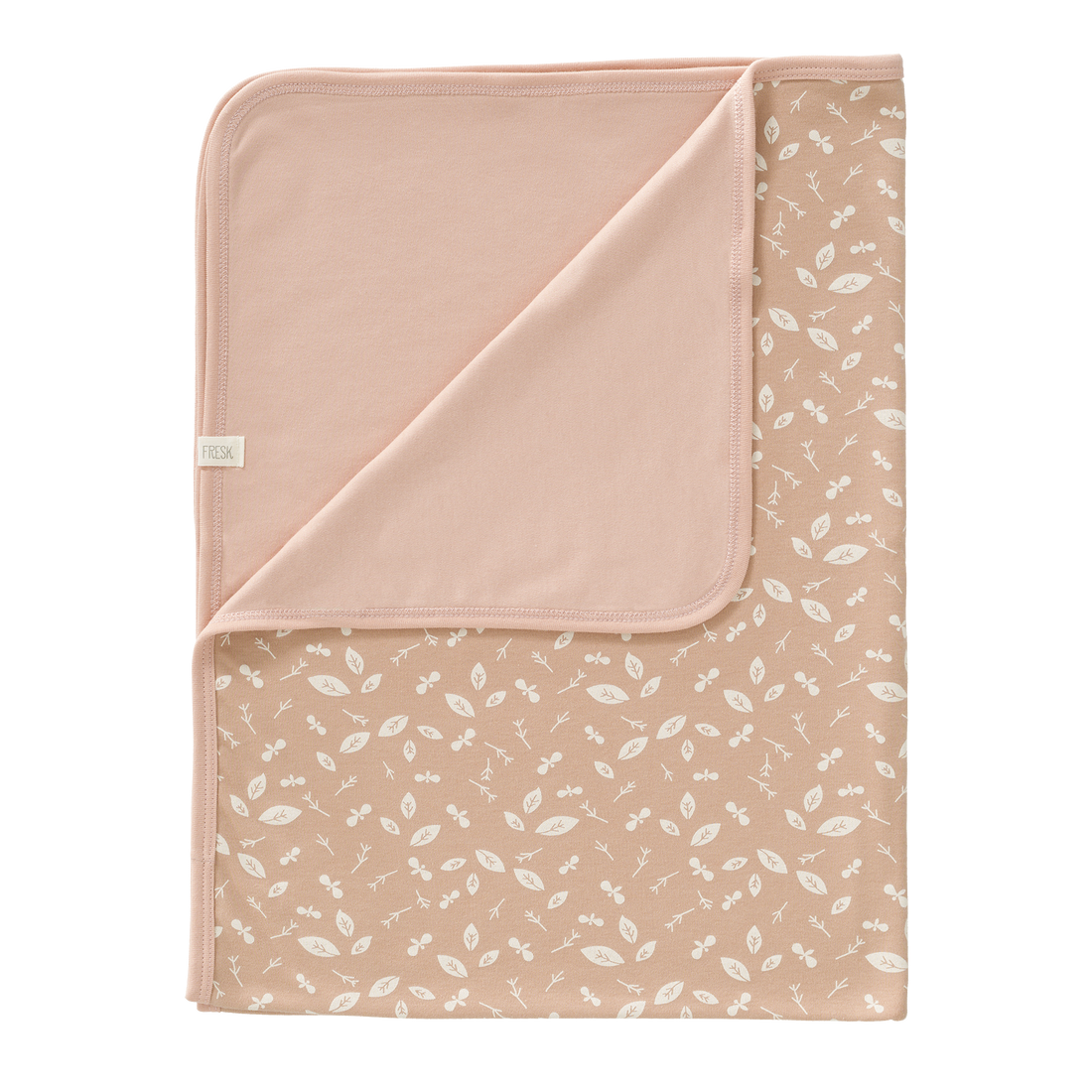 Babydecke mir Blätterprint in rosa aus Biobaumwolle, fair produziert von Fresk in Niederlande