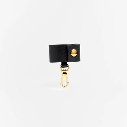 Any Di - SunCover | Strap Clip schwarz/ gold