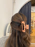 Haarkalmmer-orange-karriert