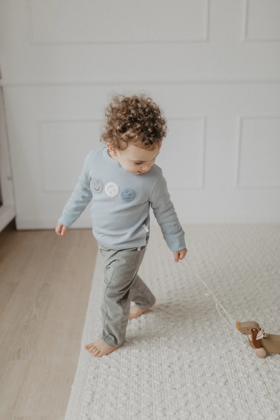 Leevje -  Kinder Langarmshirt Waffelpique Smiley Baumwolle (bio)
