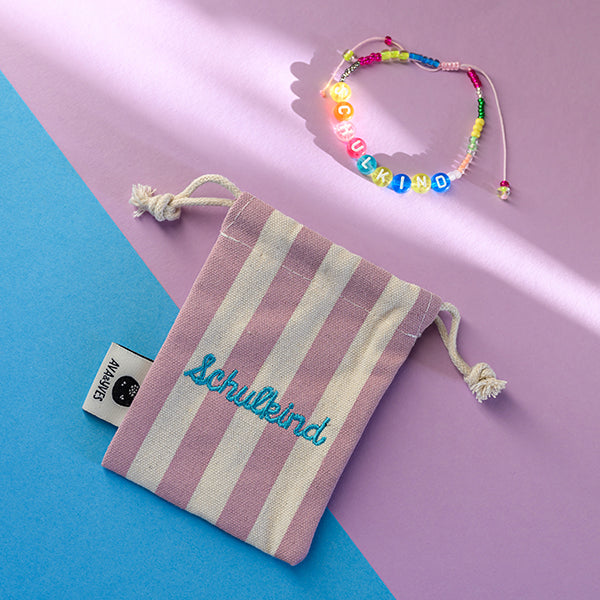 Ava & Yves -Perlenarmband Schulkind in bunt mit Säckchen rosa