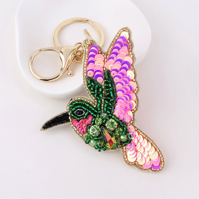 Blossify - Schlüssel- &amp; Taschenanhänger „Embellished Hummingbird“