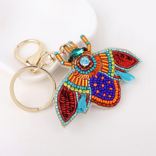 Blossify - Schlüssel- &amp; Taschenanhänger „Embellished Moth“