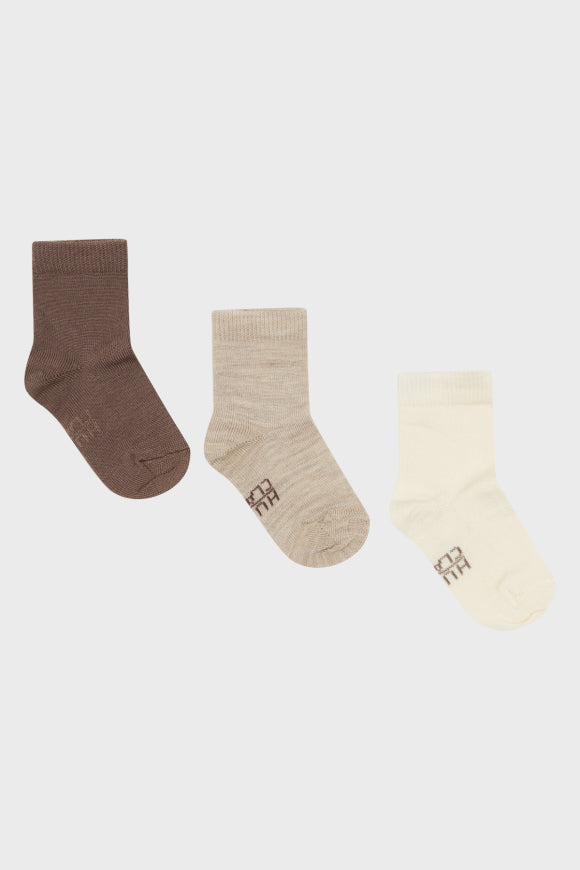 Klassischer Socken mit einem Hust&amp;Claire-Logo unter dem Fuß von Hust &amp; Claire Die Socken haben innen Bambus-Viskose und außen Wolle.