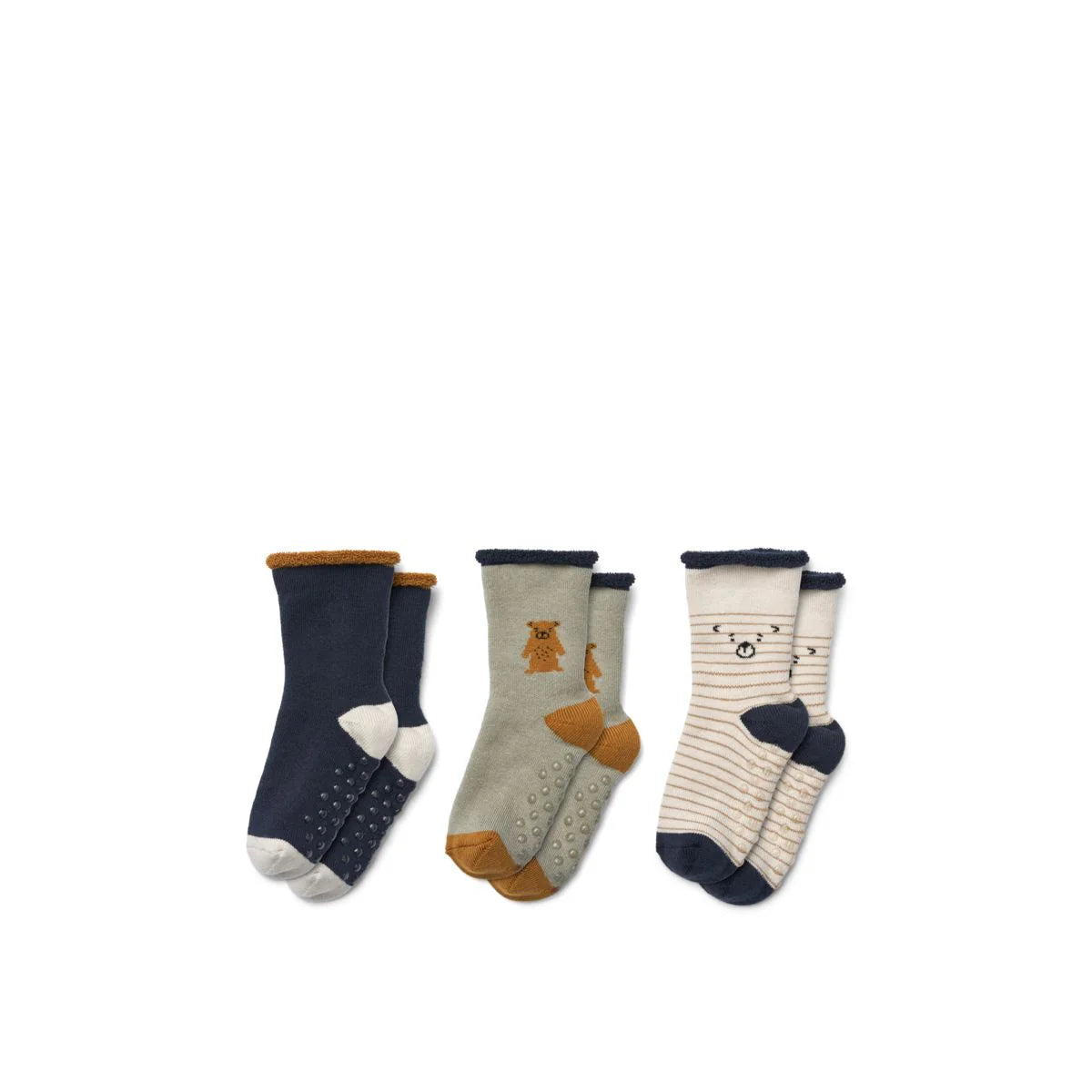 Die Eloy Socken sind ein echter Alltagsklassiker für die jüngsten Füße und bieten eine weiche und bequeme Basis mit weichem und atmungsaktivem Frottee, einem rutschfesten Muster auf der Unterseite und verspielten Farbkontrastdetails.