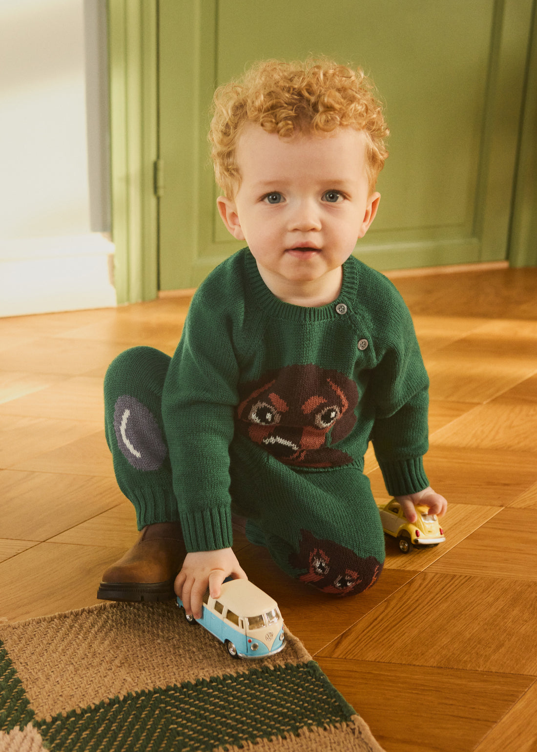 Molo - Strickpullover in grün - Junge / Kinder mit Dackel-Print