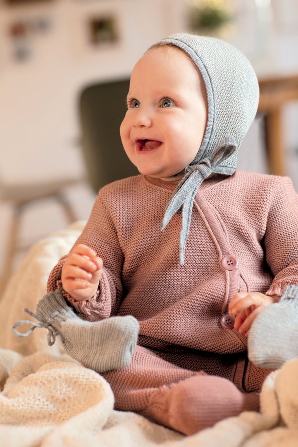 Disana - Baby Strickoverall aus bio Wolle rosa, GOTS zertifiziert